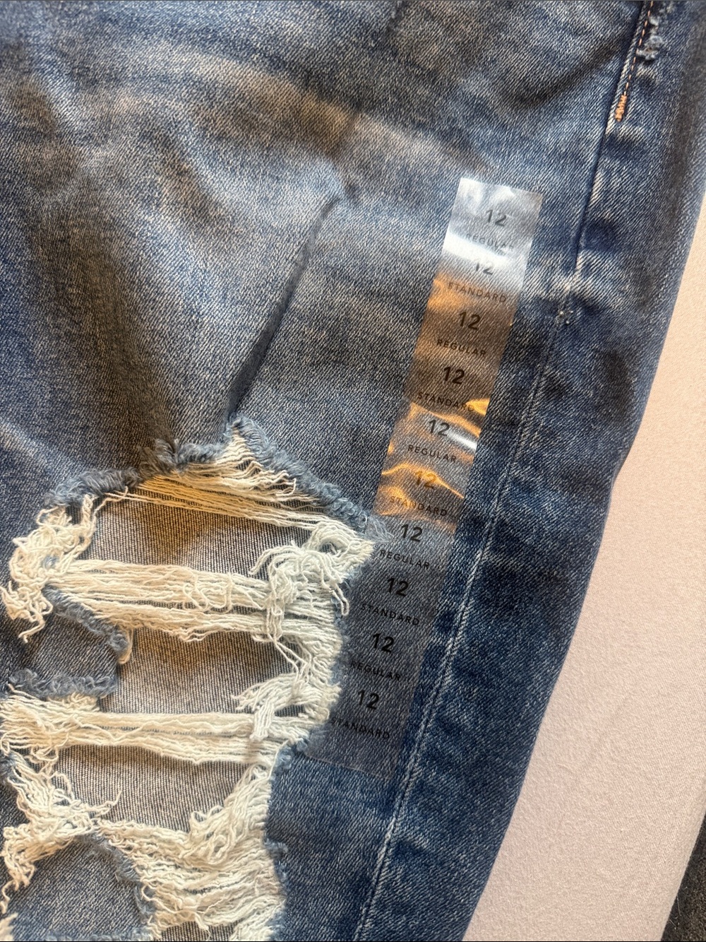 Distressed Women's Blue Ripped Jeans - Picture 2 of 5